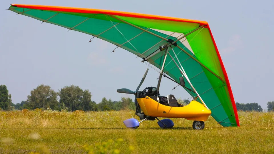 Powered hang glider take‑off from Kazanlak Airfield toward Koprinka and Shipka