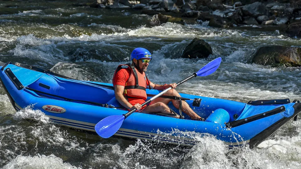 Group of kayakers running rapids on the Struma River