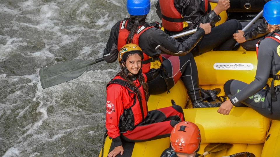 Cliff jump during family rafting on the Struma River