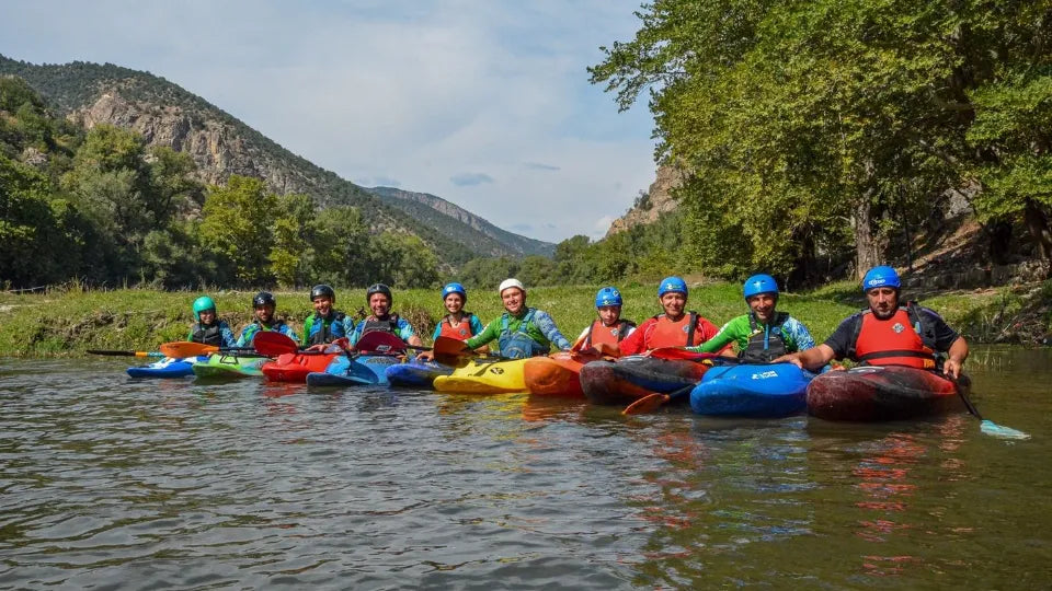 Instructor demonstrating whitewater techniques on the Struma River