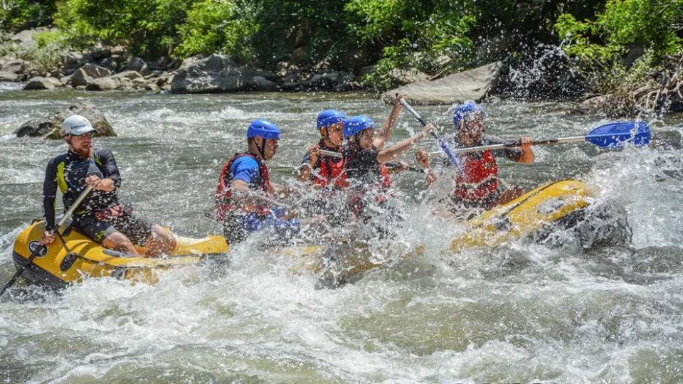 Jumping from the rock during Struma River rafting in the Kresna Gorge