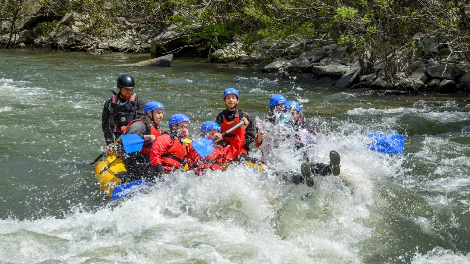 Rafting gear—helmets, life jackets and wetsuits at the base by Kresna Gorge