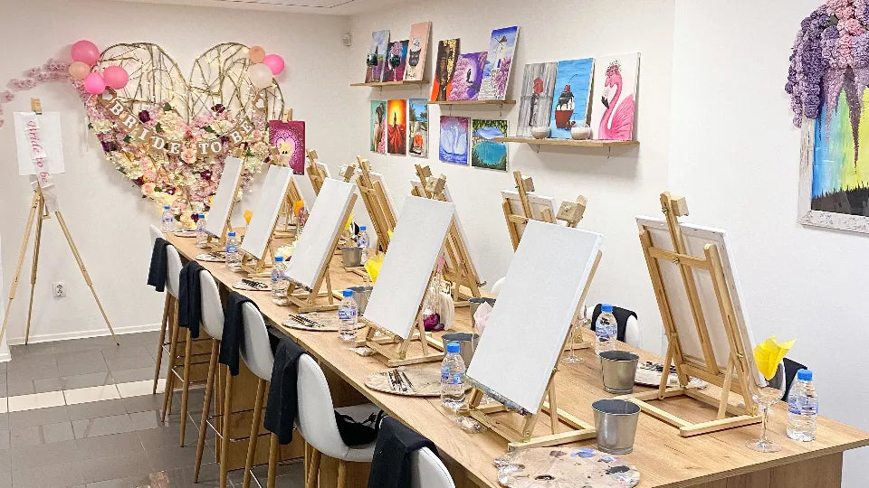 Professional artist guiding a group at a paint-and-sip, Sofia Center