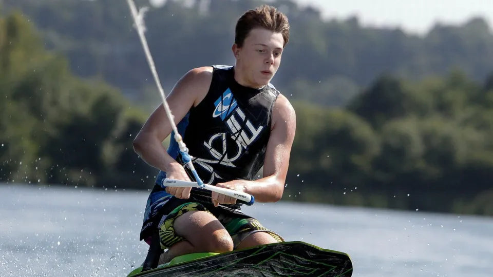 Kneeboarding at Batak Reservoir with video recording