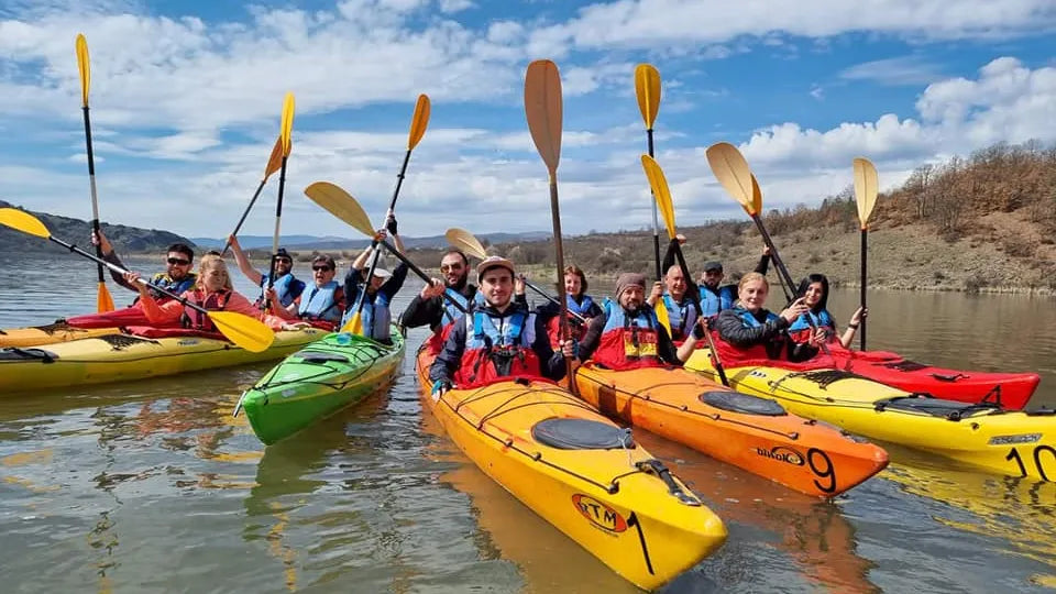 Kayaking at Pchelina Reservoir on calm water in tandem kayaks