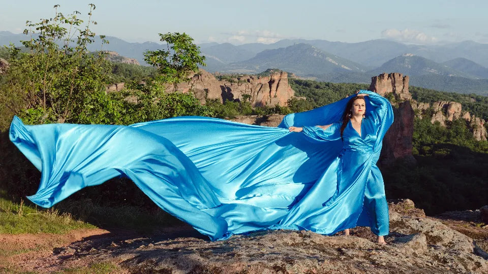 Assistants arranging a 7-metre train during a Belogradchik Rocks photoshoot