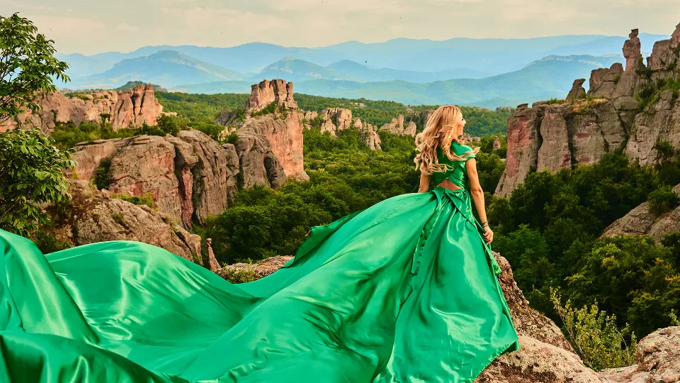 Professional photographer shooting a flowing gown at the Belogradchik Rocks