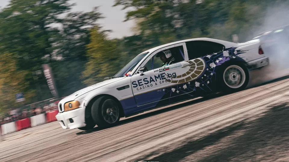 Instructor guiding a driver during a drift session at Sapareva Banya Circuit