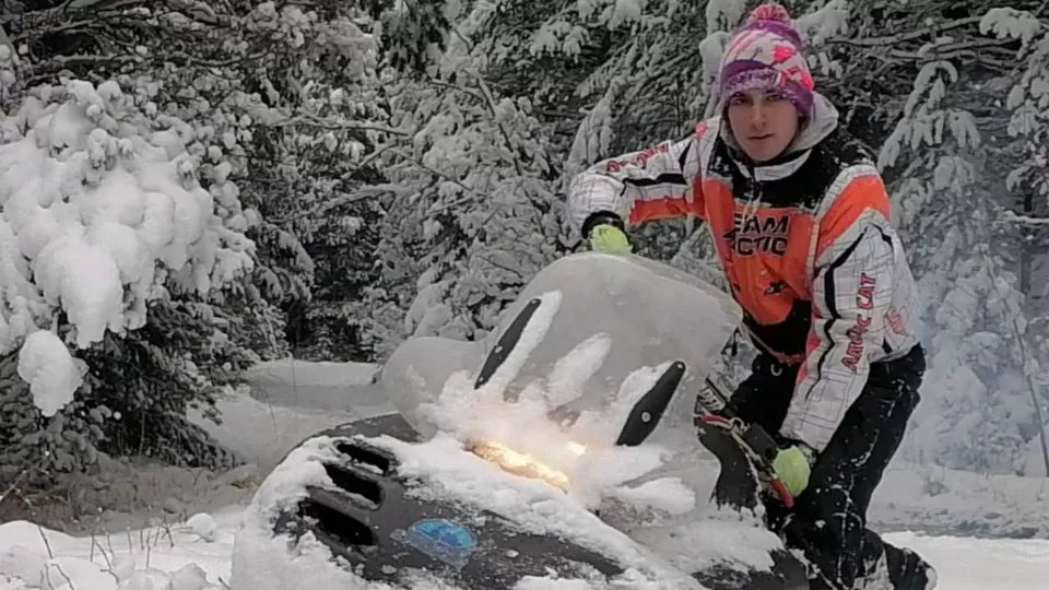 Riding a snowmobile across South Vitosha plateaus