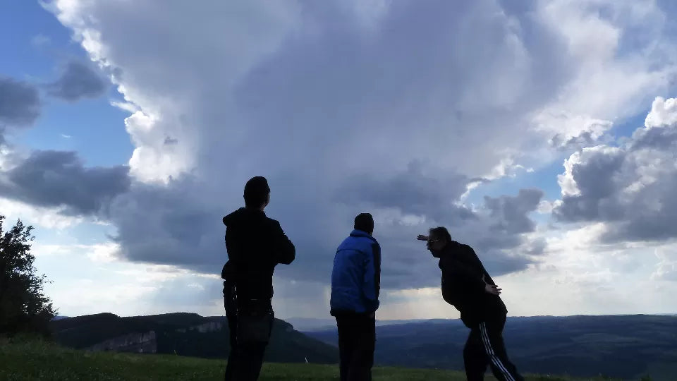 Paraglider soaring over the Fore-Balkan hills near Gabrovo
