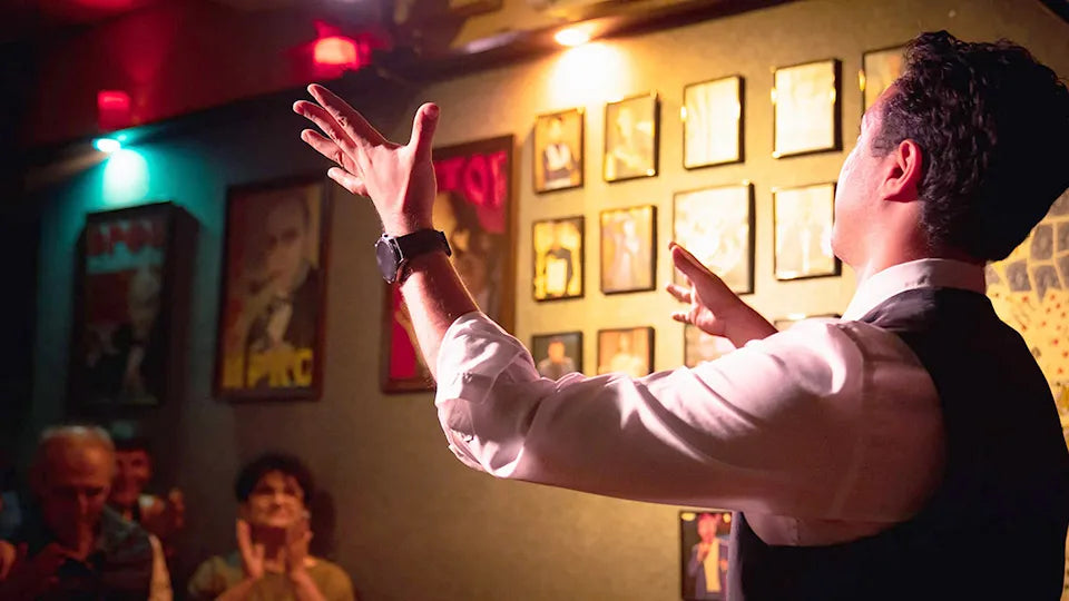 Magician performing a close‑up trick at a bar in central Sofia