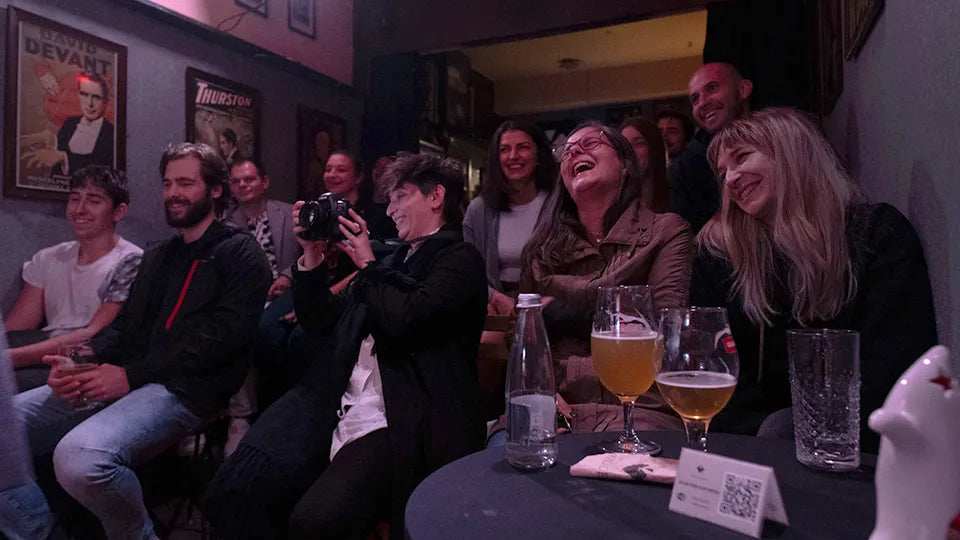 Audience enjoying a magic show in a Sofia bar