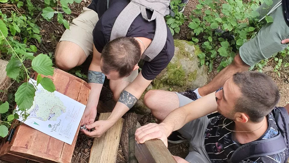 Players solving map-based puzzles in the Vitosha forest