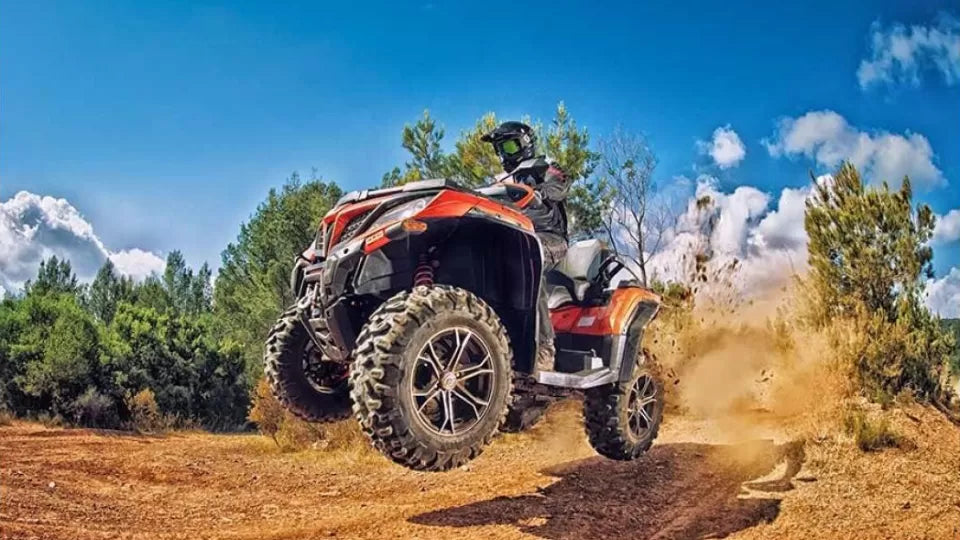 Two‑seat ATV on sandy terrain by Golden Sands, Varna area