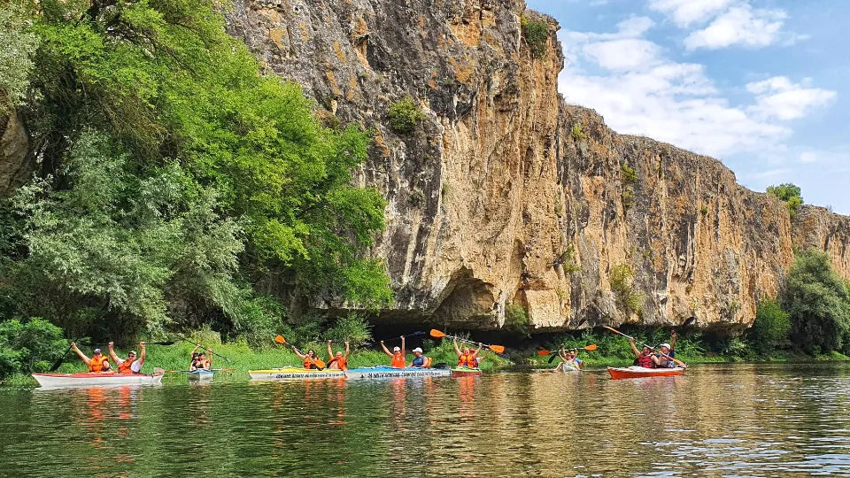 Kayaking to rock canopies on the Yantra River by Belianovo