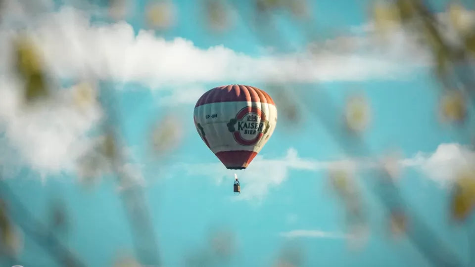 Hot air balloon basket with views of Plovdiv and the Maritsa River during ascent