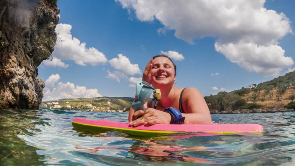 Stand-up paddleboarding to a quiet cove in Pelion, Greece