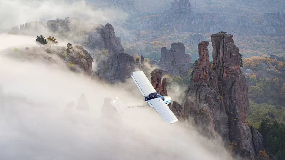 Airplane flight over the Belogradchik Rocks — cockpit view