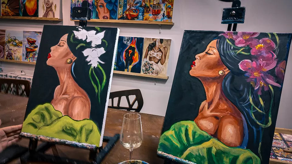 Finished canvases and a glass of wine – paint and sip voucher Sofia