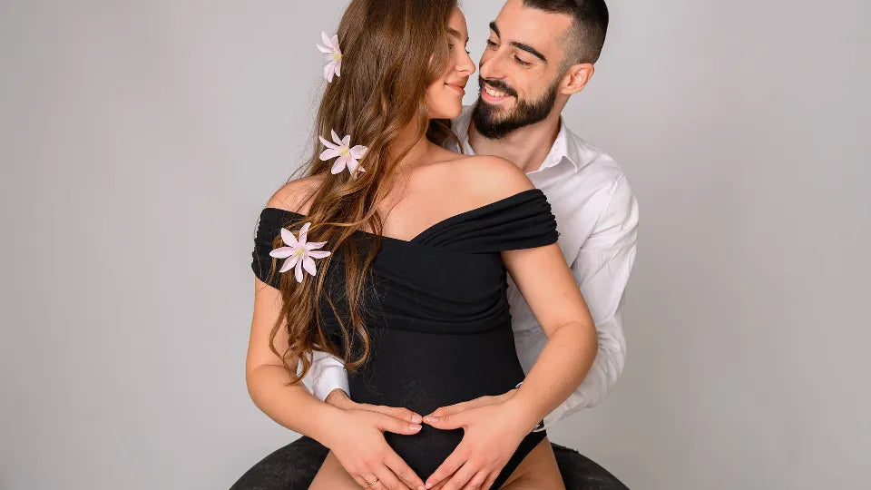 Maternity studio photoshoot with dress and props in Sofia