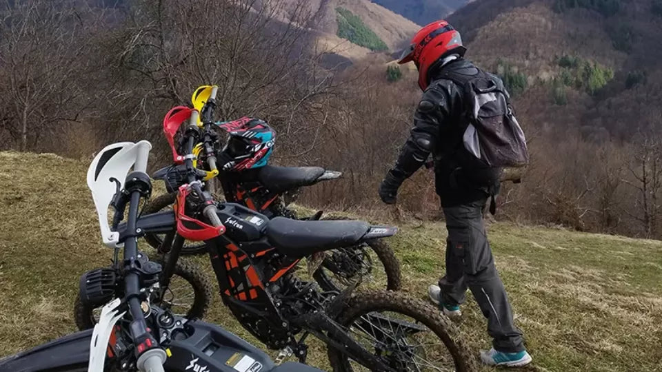Riding a Sur‑Ron Light Bee on a dirt road above Ribaritsa
