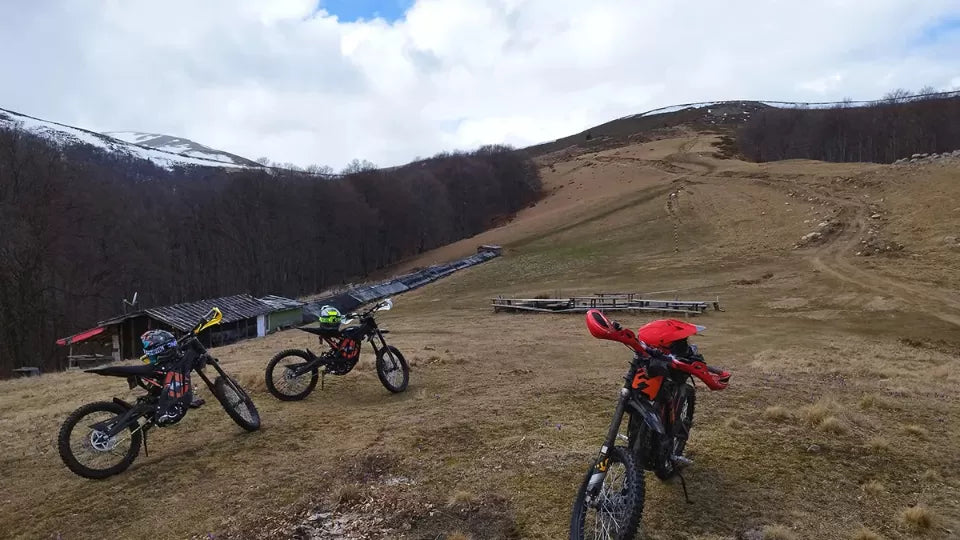 Riding a Sur-Ron Light Bee on a forest trail above Ribaritsa
