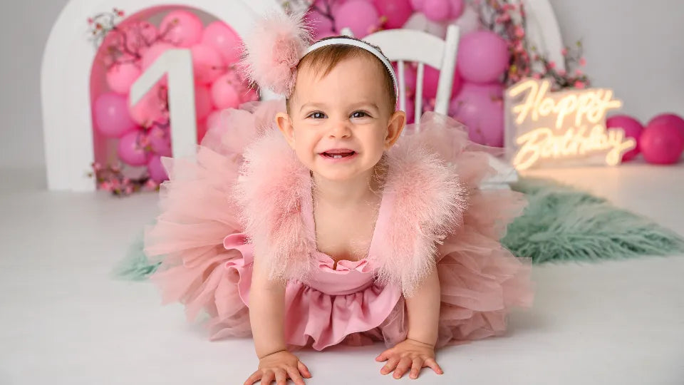 Cake smash photoshoot in Sofia – baby with first-birthday cake in studio