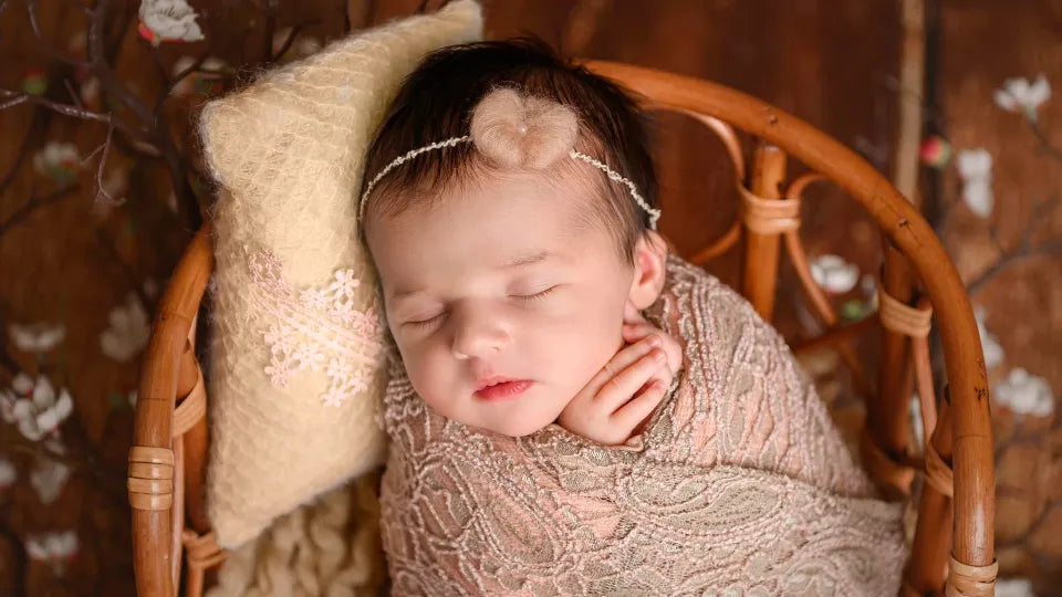 Photographer arranging props for a newborn shoot, Sofia