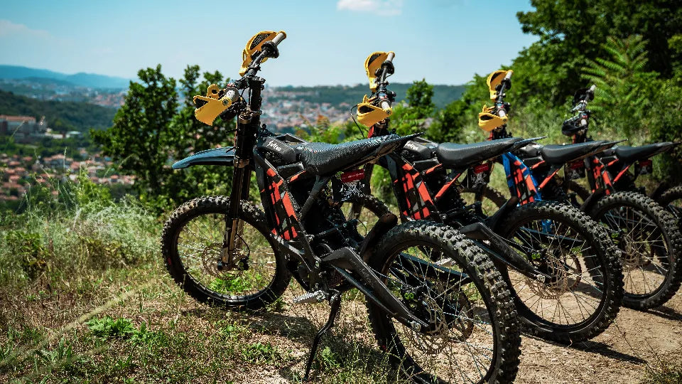 Group led by instructor on electric dirt bikes near Veliko Tarnovo