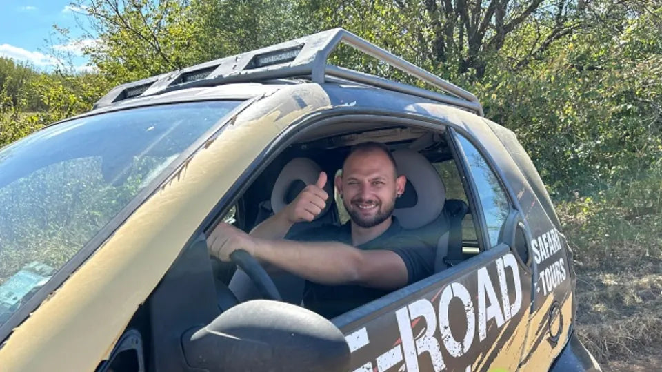 Modified Smart ForTwo on a hillside off‑road route above Veliko Tarnovo