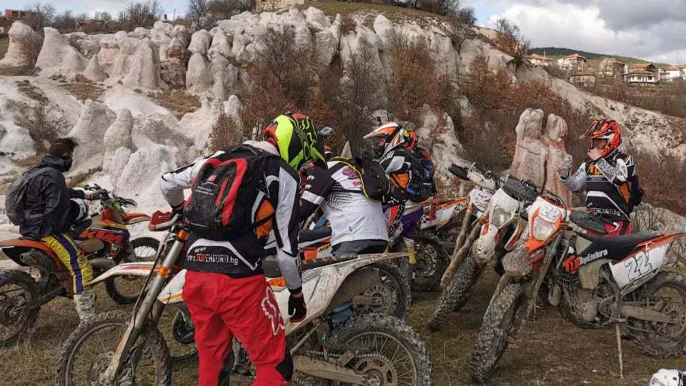 Full enduro protective gear and KTM bike prepared for an off‑road ride in Bansko