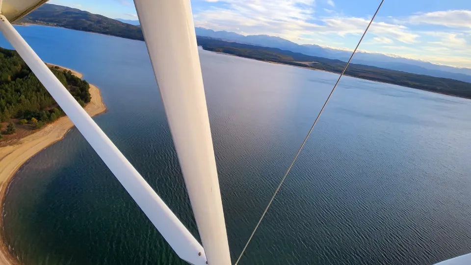 Aerial views over Lake Iskar after water take-off