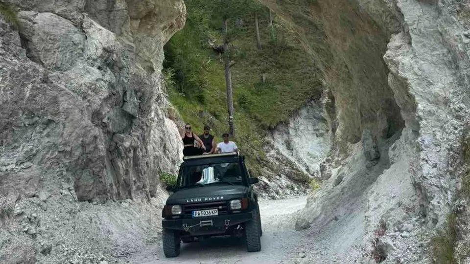 Off-road 4x4 driving through conifer forests to the Chairski Lakes