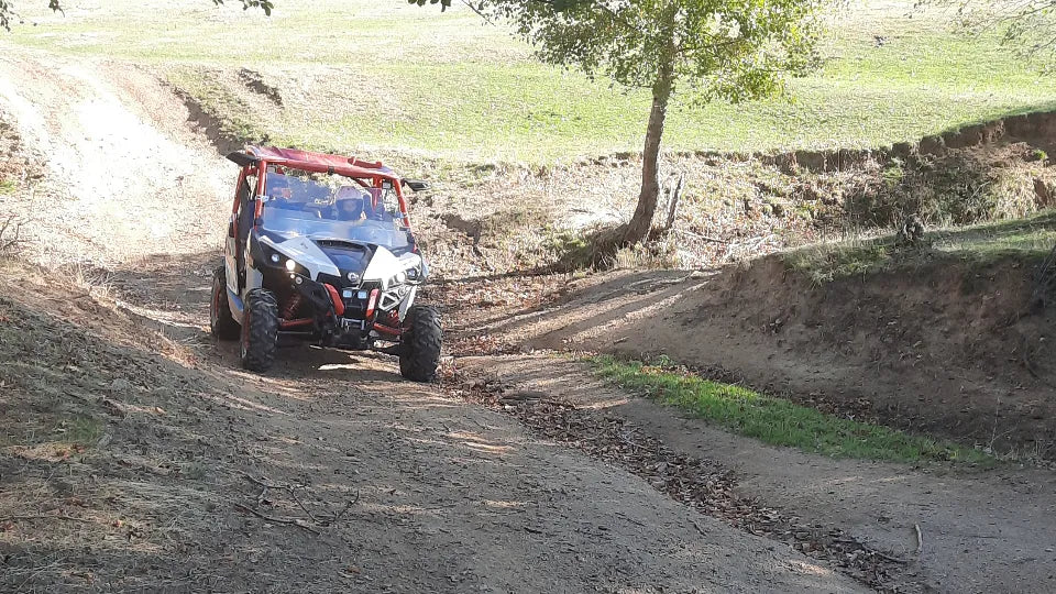 Participant driving a Can‑Am 1000R near Kalofer