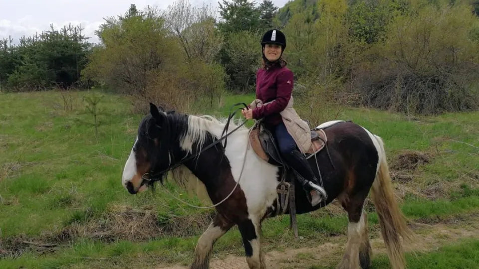 Two people on a private horse riding lesson in Borovets