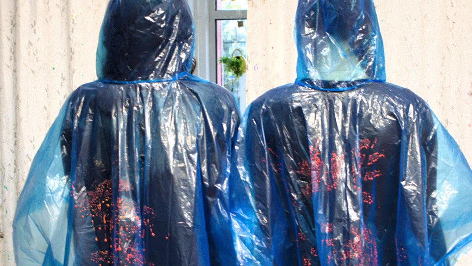 Instructor guiding participants in an action painting class, Sofia