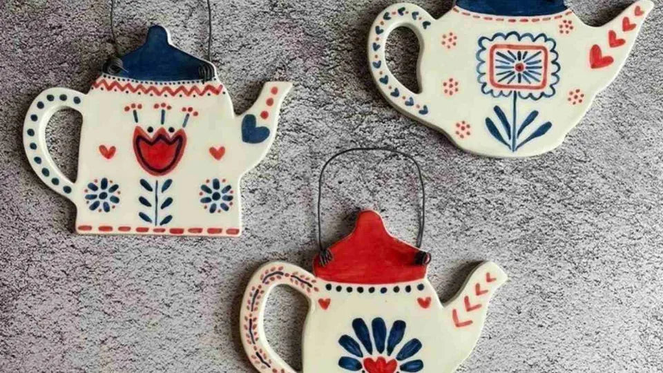Finished children’s ceramic pieces after kiln firing – Sofia