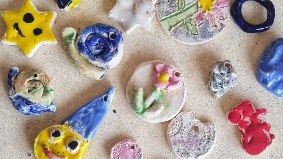 Children glazing ceramic pieces at a Sofia studio