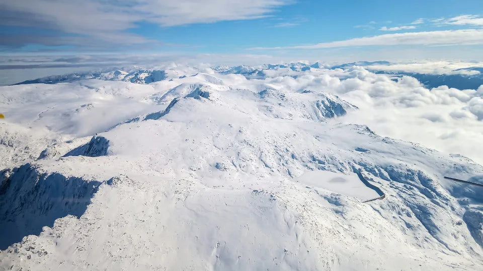 Dual controls with instructor during winter mountain flying lesson
