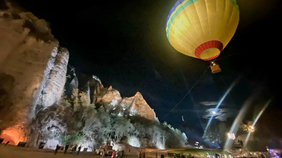 Hot air balloon basket during a panoramic ascent in Melnik