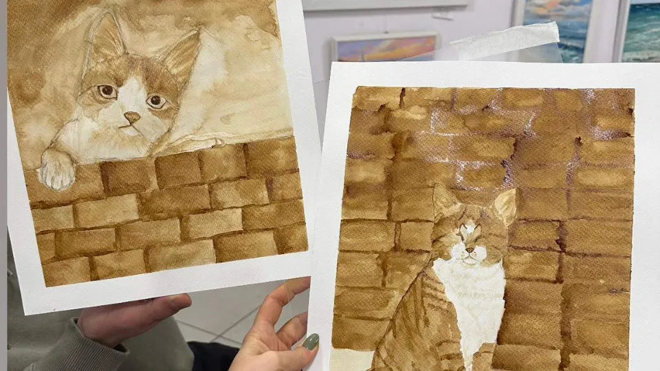 Framed artwork created with coffee after the workshop