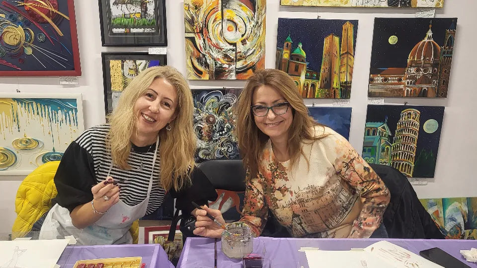 Artist giving guidance at a wine painting workshop in Borovo
