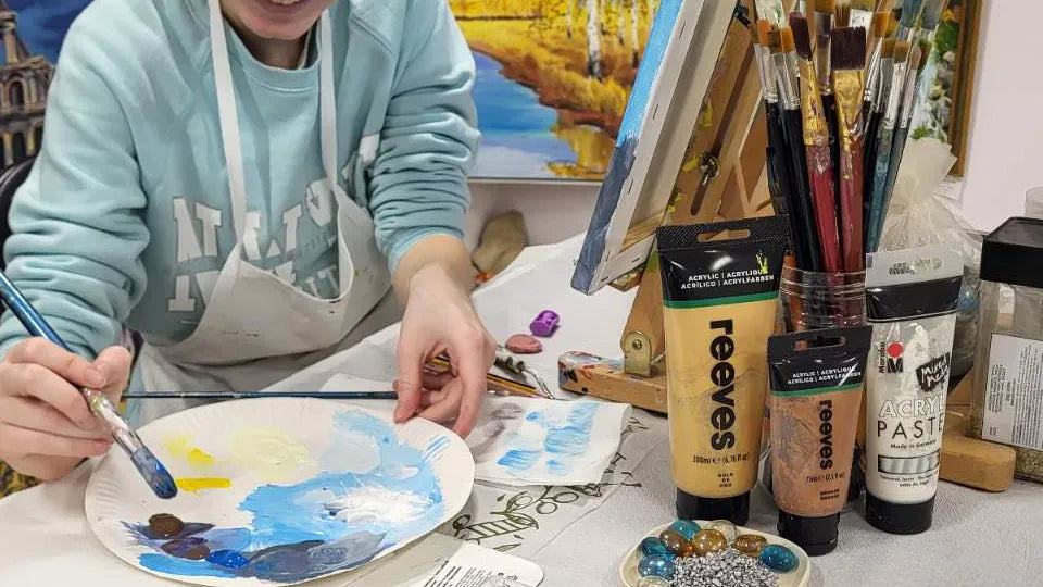 Brushes, palette knives and paints for mixed media class in Sofia Borovo