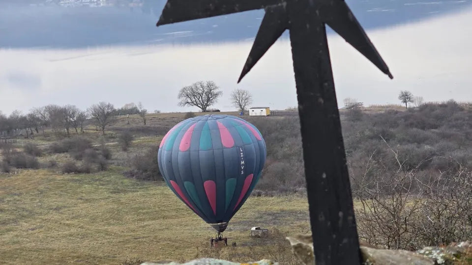 View of Pchelina Reservoir from a hot air balloon at sunrise