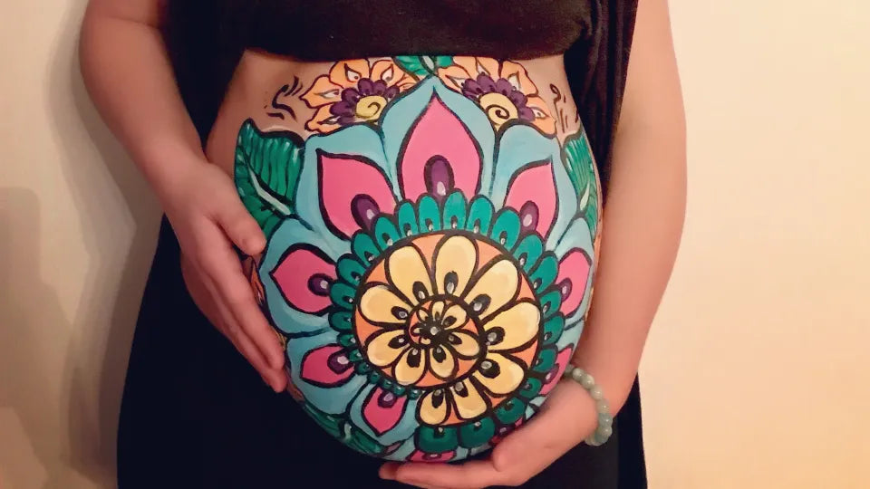 Pregnancy body art therapy in Sofia — hand‑painted belly art session