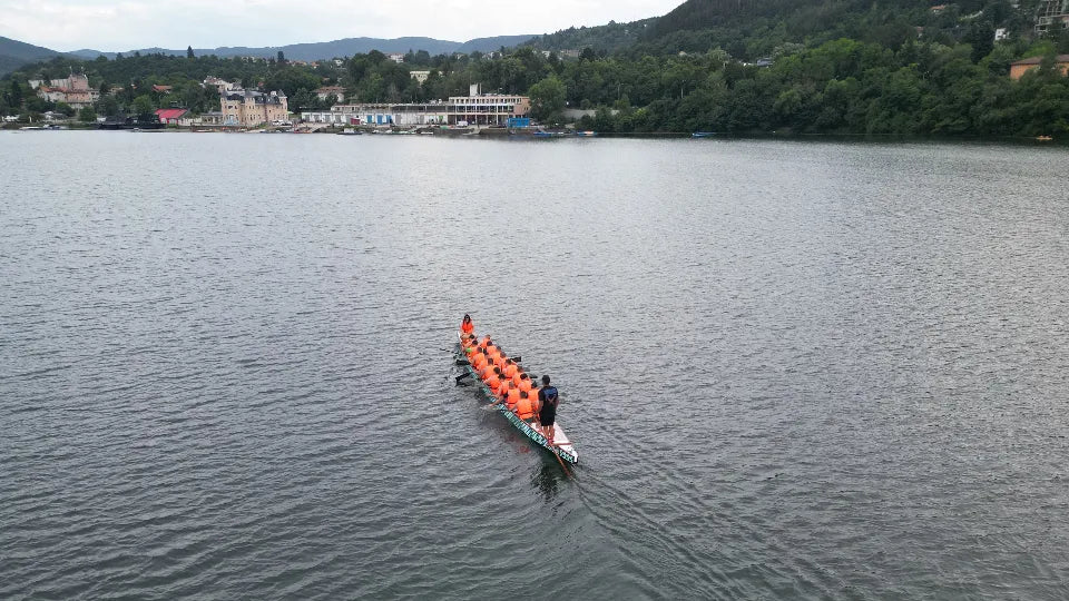 Sunset dragon boat scene on Pancharevo Lake