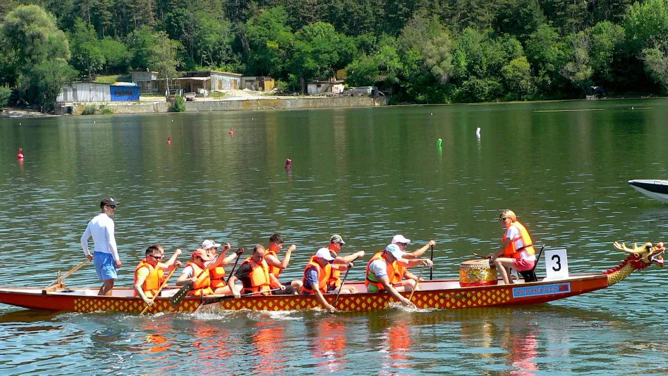 Instructor-led dragon boat with full safety gear at Pancharevo