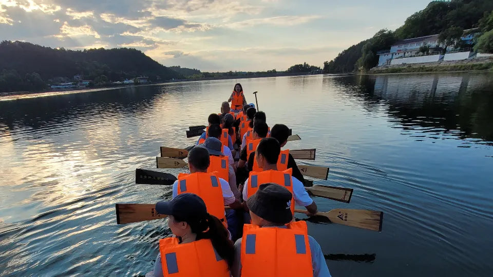 Team dragon boat paddling near Sofia at Pancharevo Lake