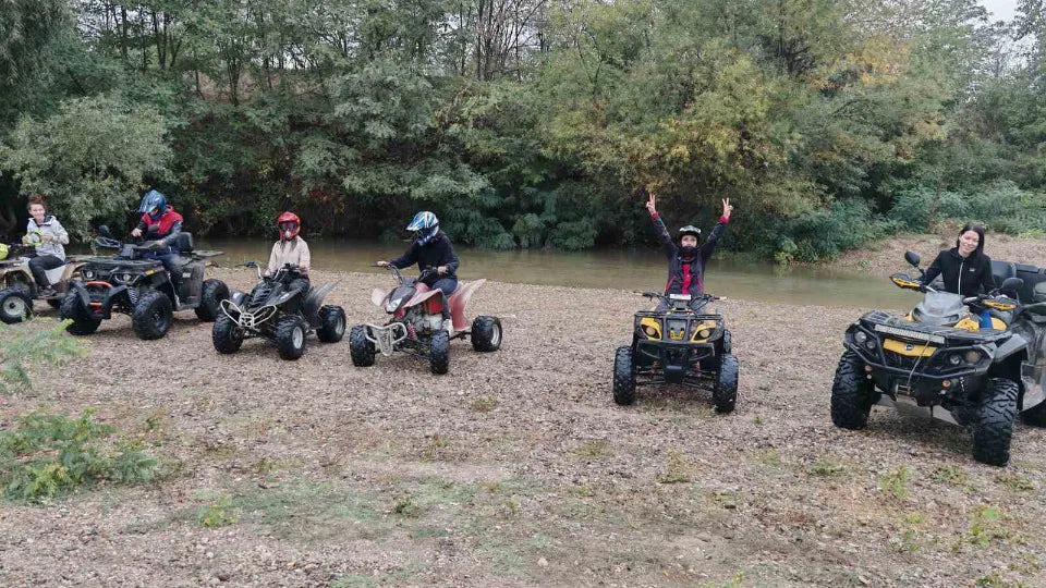ATV 50 CC for a child and 200 CC for an adult on a family off‑road tour