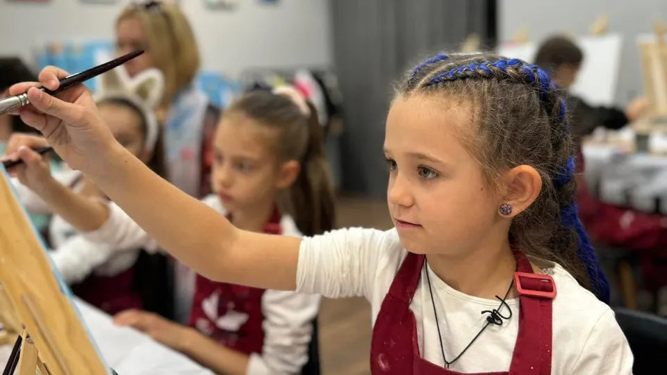 Children painting with acrylics at Bulgaria Mall studio, Sofia
